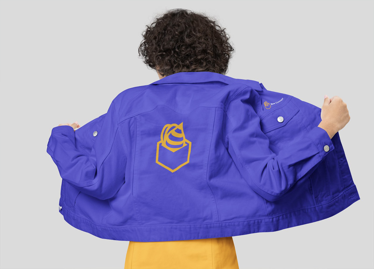 Merch on model with Bee concept branding applied on a purple jacket