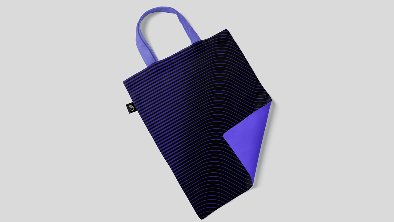 Bee concept Branding Application on Tote bag. Pattern lines of the brand on one side and purple on the other side
