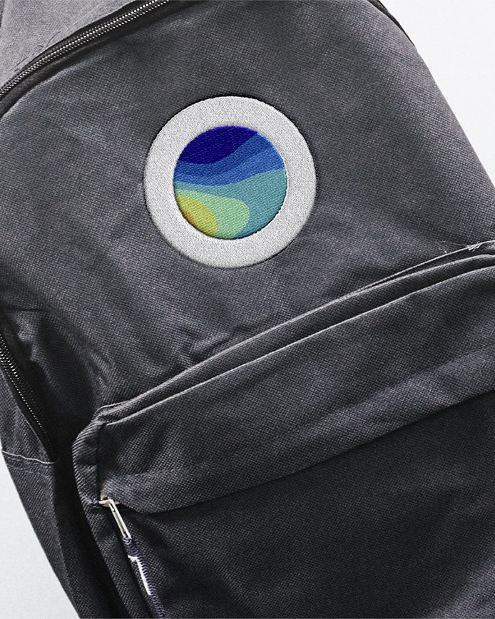Embroidered logo design on a backpack for COLD Cooling Lab Division by Main Division