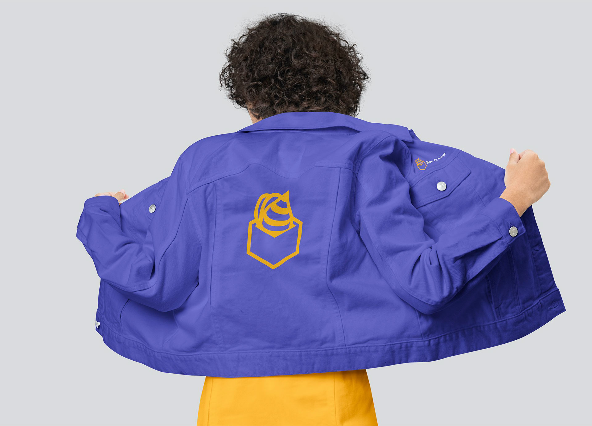 bee symbol of Bee Concept on a jacket apparel merch, design by main Division
